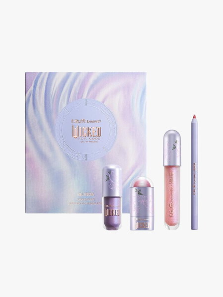 r.e.m. beauty Wicked Glinda Makeup Set in branded components on a light gray background